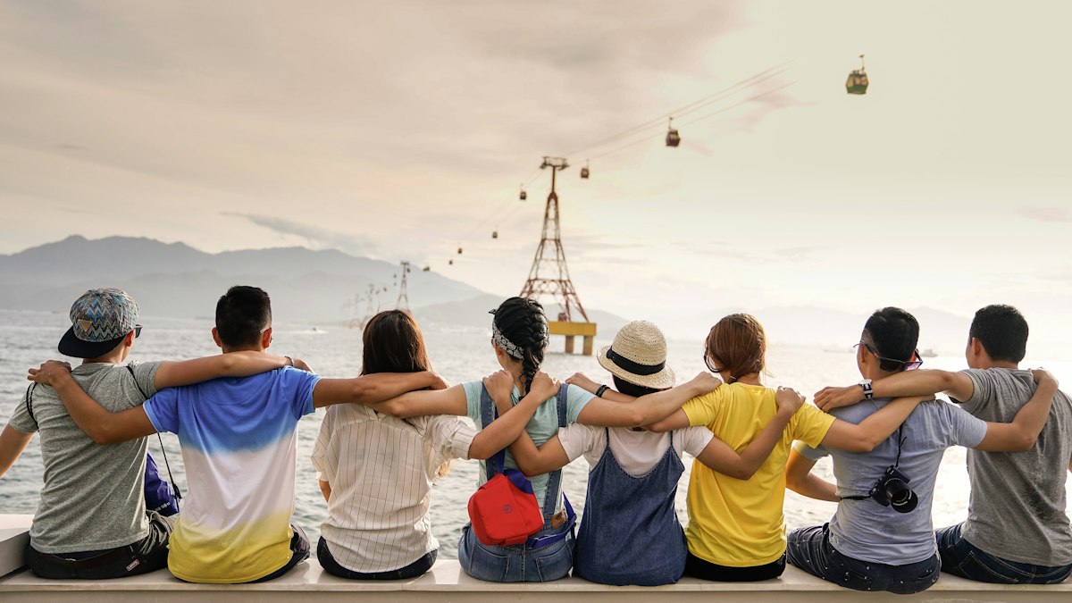 Group of friends looking out over a city