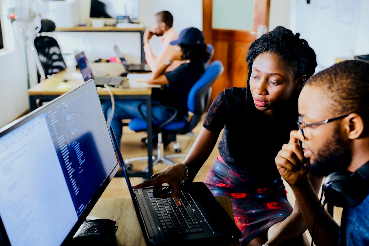 Developers working together at a computer